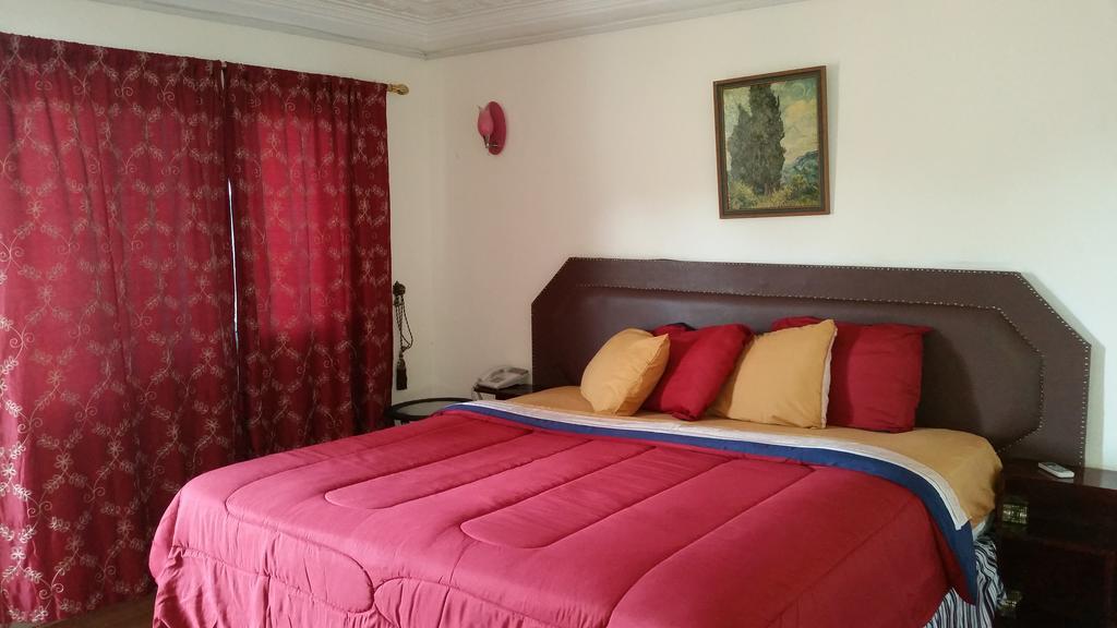 Zambezi Inn Hotel Conakry Quarto foto